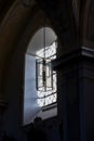 Beautiful window and a lamp in the german catholic church. Light and shadow, details. Pilgrimage Church Wallfahrtskirche