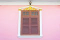 Beautiful window on pink wall in Sino Portuguese style at Soi Ro Royalty Free Stock Photo