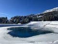 Beautiful winter atmosphere on storage lake Valos or reservoir lake Valos (Speichersee Valos)