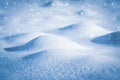 Beautiful winter background of snow drifts and falling snow Royalty Free Stock Photo