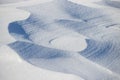 Beautiful winter background with snowy ground. Natural snow texture. Royalty Free Stock Photo