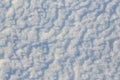 Beautiful winter background with snowy ground. Natural snow texture. Royalty Free Stock Photo