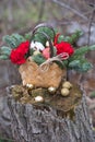 Beautiful winter bouquet of spruce, apples, carnations and cotton.