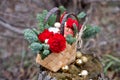 Beautiful winter bouquet of spruce, apples, carnations and cotton.