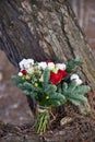 Beautiful winter bouquet of spruce, roses and cotton. The bride`s bouquet.