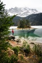 Beautiful winter day at the Eibsee near grainau at the mountain zugspitze,