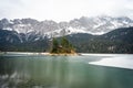 Beautiful winter day at the Eibsee near grainau at the mountain zugspitze,