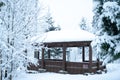 Beautiful winter forest and snow-covered house. Royalty Free Stock Photo