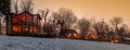 Beautiful winter huts on quiet snowy night