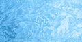 Beautiful winter ice, blue texture on window, festive background Royalty Free Stock Photo