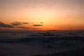 Beautiful winter landscape; field covered in snow during sunset / Sunrise Royalty Free Stock Photo