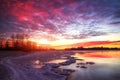 Beautiful winter landscape with frozen lake and sunset Royalty Free Stock Photo