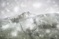 Stuning Winter landscape image of Chrome Hill and Parkhouse Hill in Peak District England in heavy snow storm