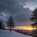 Beautiful Winter landscape image from mountain top in Scottish Highlands down towards Rannoch Moor during snow storm Royalty Free Stock Photo