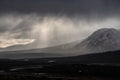Beautiful Winter landscape image of view along Rannoch Moor during heavy rainfall giving misty look to the scene Royalty Free Stock Photo