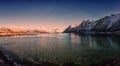 Beautiful winter landscape, lake with snowy mountains with serene blue sky, natural travel outdoor background, Lofoten Islands Royalty Free Stock Photo
