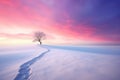 Beautiful winter landscape with lonely tree on snowy field at sunset Royalty Free Stock Photo