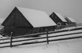 Beautiful winter landscape in the mountains. Sunrise. Carpatian valley with fog and snow. Carpathian winter mountains. Early morni