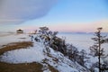 Beautiful winter landscape. Olkhon Island. Frozen Lake Baikal, the surface of the ice in the snow Royalty Free Stock Photo