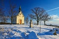 Beautiful winter landscape photo with church. Sunny winter day. Brno - Lisen. Chapel of Our Lady of Helper. Royalty Free Stock Photo