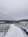 Beautiful winter landscape with the rural road covered with snow, Larvik, Norway Royalty Free Stock Photo