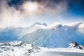 Beautiful winter landscape with snow-covered mountains at sunset Royalty Free Stock Photo