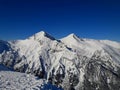 Beautiful winter landscape. Snow on the mountain with blue sky background. Mount Carpathians in the Bansko region of Bulgaria. Royalty Free Stock Photo