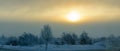 Beautiful winter landscape. Sunset on a frosty day. Panorama. Royalty Free Stock Photo