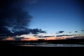 Beautiful winter landscape during sunset over snow covered field Lithuania Royalty Free Stock Photo