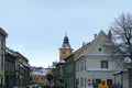 Beautiful winter landscape view of Muresenilor street Strada Muresenilor. Colorful medieval buildings against blue sky.