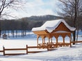 Beautiful winter landscape with a wooden patio on a Sunny frosty day. Royalty Free Stock Photo