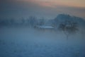 The fog rises as the sun sets Royalty Free Stock Photo