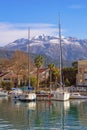 Beautiful winter Mediterranean landscape. Boats in harbor on sunny day. Montenegro, Tivat city Royalty Free Stock Photo