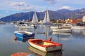 Beautiful winter Mediterranean landscape, sailboats and fishing boats on water. Montenegro, Kotor Bay