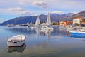 Beautiful winter Mediterranean landscape. Sailboats and fishing boats on water. Montenegro