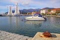 Beautiful winter Mediterranean landscape. Sailboats and fishing boats on water. Montenegro, Kotor Bay