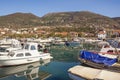 Beautiful winter Mediterranean landscape with small harbor for fishing boats.  Montenegro. View of Marina Kalimanj in Tivat city Royalty Free Stock Photo