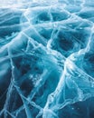 Beautiful winter natural blue ice texture of surface of frozen Lake in cold day. Nature abstract pattern of white cracks Royalty Free Stock Photo