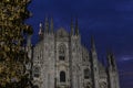 Beautiful winter panoramic view to the Duomo of Milan and Christmas tree in early morning hours. Royalty Free Stock Photo