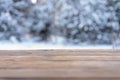 Beautiful winter scene. blurred background of snowy christmas nature background, Wood table top on shiny bokeh. For product Royalty Free Stock Photo