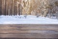 Beautiful winter scene. blurred background of snowy christmas nature background, Wood table top on shiny bokeh. For product Royalty Free Stock Photo