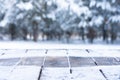 Beautiful winter scene. blurred background of snowy christmas nature background, Wood table top on shiny bokeh. For product Royalty Free Stock Photo