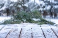 Beautiful winter scene. blurred background of snowy christmas nature background, Wood table top on shiny bokeh. For product Royalty Free Stock Photo