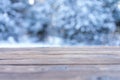 Beautiful winter scene. blurred background of snowy christmas nature background, Wood table top on shiny bokeh. For Royalty Free Stock Photo