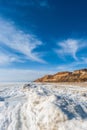 Beautiful winter seascape. Black Sea is covered with ice. Royalty Free Stock Photo