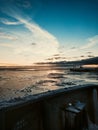 Beautiful winter seascape from cargo ship. Sunrise at cargo port. Royalty Free Stock Photo