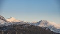 Beautiful Winter sunrise landscape image of Mount Snowdon and ot