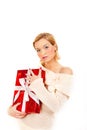 Beautiful winter woman with christmas present Royalty Free Stock Photo