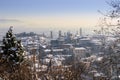 Beautiful winters scene looking down on snow covered buildings and church towers