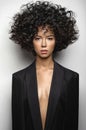 Beautiful woman with afro curls hairstyle Royalty Free Stock Photo